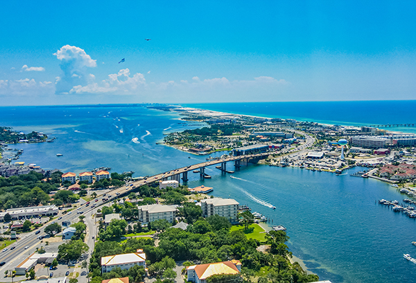 Aerial view of Fort Walton Beach Florida showing bridge, waterway, and coastline